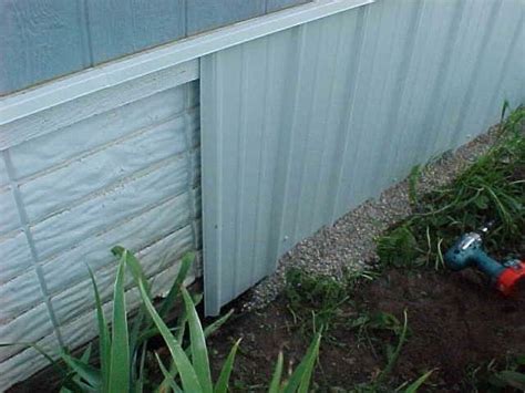 metal skirting on house|galvanized metal underpinning.